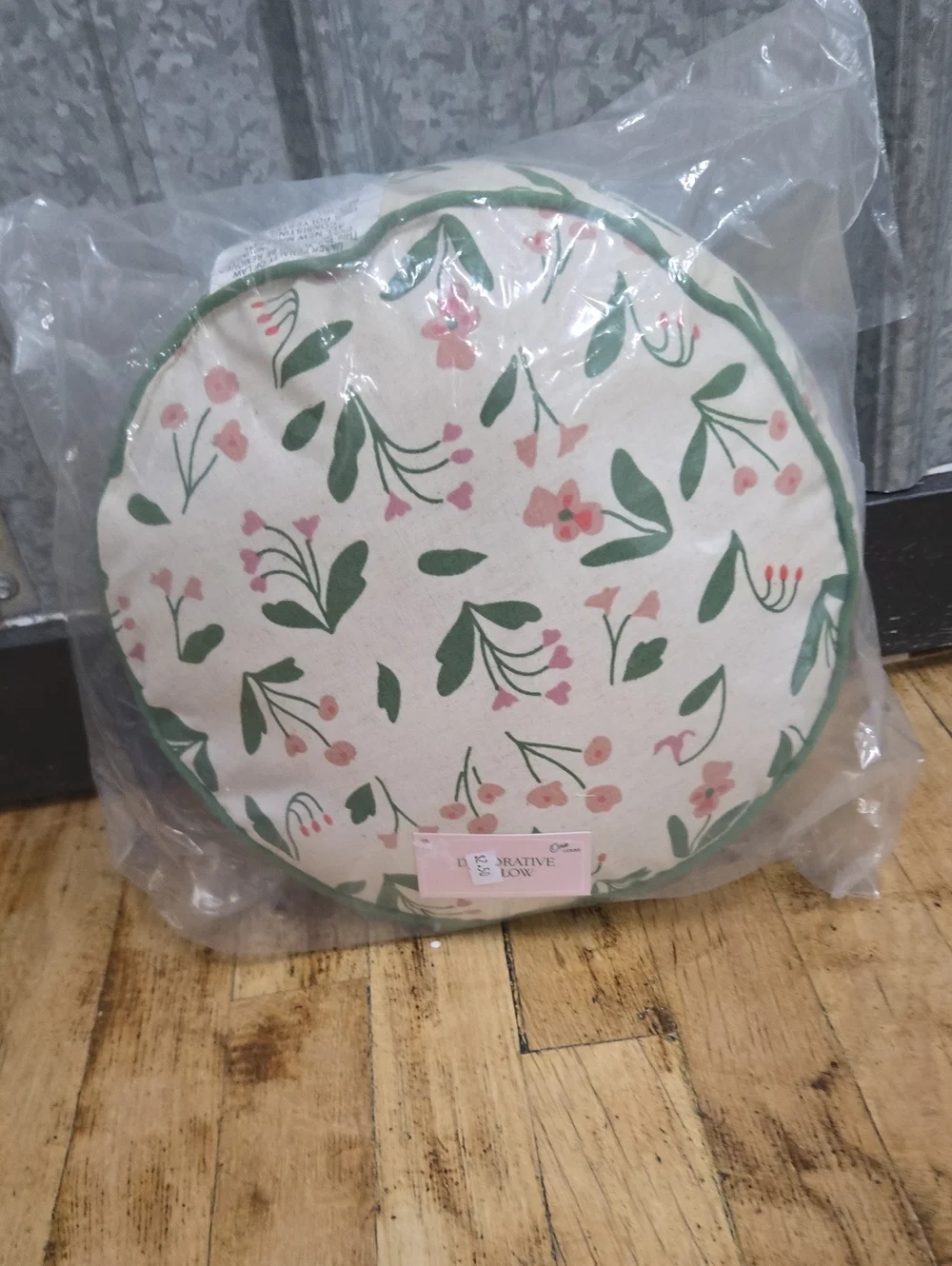 a new day Round Floral Throw Pillow in Green and Pink